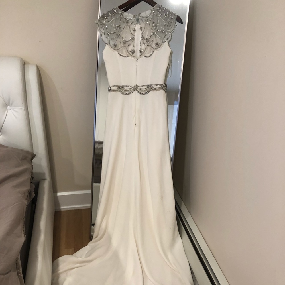 Wedding dress. Worn once .After dry cleaning